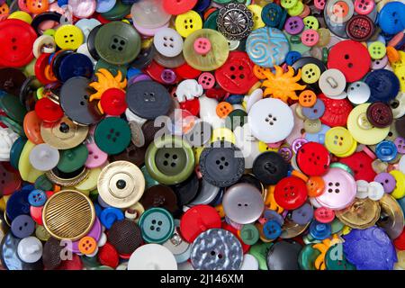 Top view many old, vintage and new buttons in various colors. Stock Photo