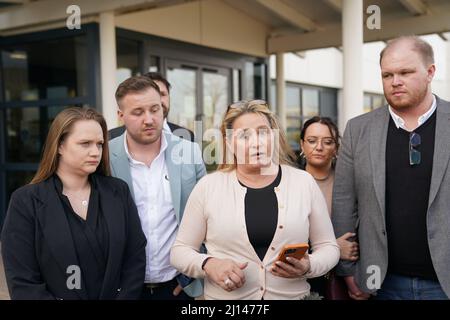 The family of Corrie McKeague (left to right) Leah McElrea, brother Daroch McKeague, mother Nicola Urquhart, and brother Makeyan McKeague, speaking to the media outside Suffolk Coroner's Court, Ipswich, Suffolk, following a verdict at the inquest into his death. The inquest jury recorded in a narrative conclusion that Mr McKeague died at approximately 4.20am in Bury St Edmunds as a result of 'compression asphyxia in association with multiple injuries'. Mr McKeague vanished on a night out in Bury St Edmunds on September 24 2016. Picture date: Tuesday March 22, 2022. Stock Photo