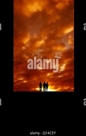 three firends in silhouette framed Stock Photo