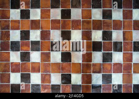 Texture of an old medieval red, black and white tile Stock Photo
