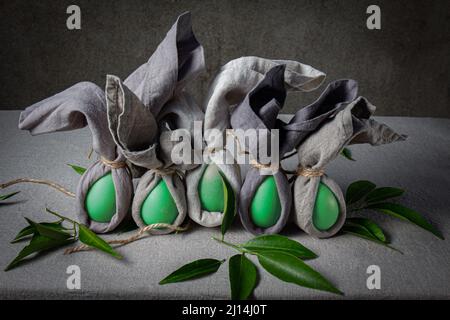 Easter background with Easter bunny made from eggs and linen napkin. Festive easter home table decorationter home table decoration Stock Photo