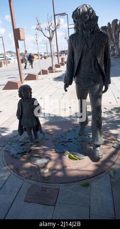 hippy father and daughter statue in Ibiza town,Spain Stock Photo