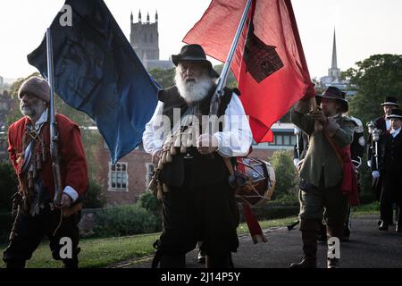 Worcester, UK. 3rd September 2021. Pictured: Re-enactors march up to the summit of Fort Royal Park with Worcester Cathedral in the background.  /Engli Stock Photo