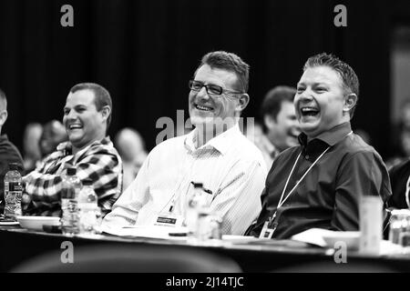 Johannesburg, South Africa - October 22, 2014: Delegates attending a sales convention in large conference hall Stock Photo