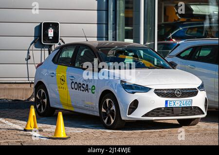 Riga, Latvia, March 18, 2022: The new fully electric Opel corsa-e at the dealers center charging station Stock Photo