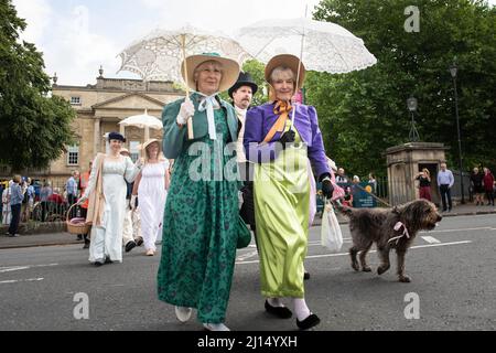 Bath, Somerset, UK. 11th September 2021. Pictured: Ladies and gentlemen dressed in Regency attired clothing begin the promenade from Holburne Museum. Stock Photo