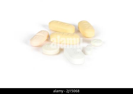 Selection of pills and tablets on white background - Prophylaxis pills for cancer patients Stock Photo