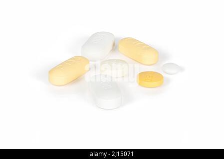 Selection of pills and tablets on white background - Prophylaxis pills for cancer patients Stock Photo