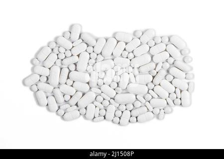 Selection of pills and tablets on pure white background, space for copy - Prophylaxis pills for cancer patients Stock Photo
