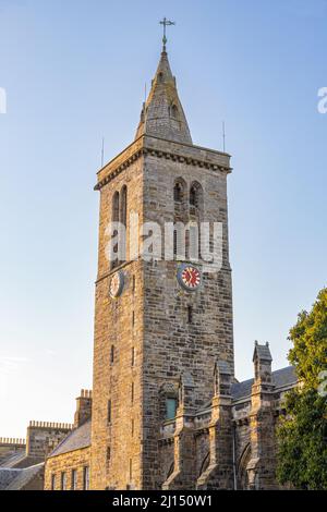 Evening light on the tower and spire of St Salvator's Chapel in North Street, St Andrews, Fife, Scotland UK Stock Photo