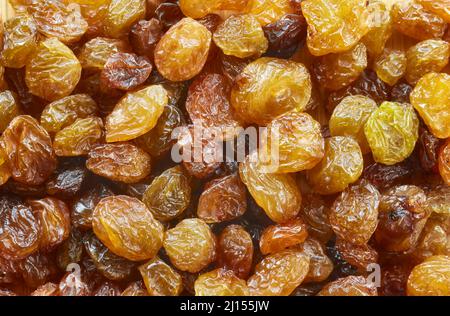 Close up picture of small raisins, selective focus. Stock Photo