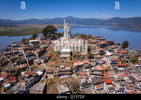 A statue of Independence hero Jose Maria Morelos commands the view on the Island of Janitzio on Lake Patzcuaro, Michoacan, Mexico. Stock Photo