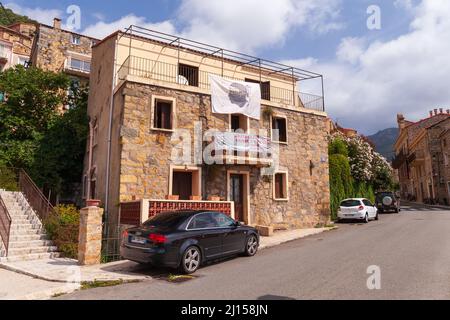 Olmeto, France - August 25,2018: Street view with old stone houses on a summer day, Corsican town Stock Photo