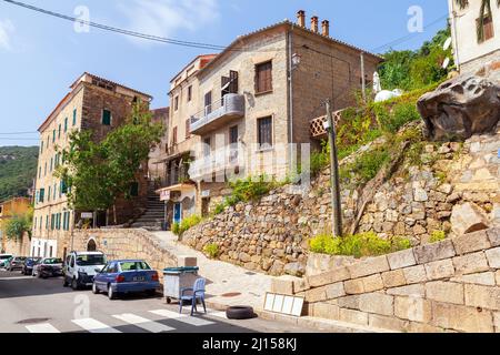 Olmeto, France - August 25,2018: Street view with old living houses on a summer day, Olmeto commune in the Corse-du-Sud department of France on the is Stock Photo