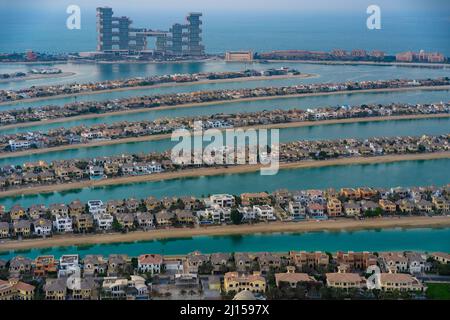 Dubai, UAE - Dec 05 2021: Aerial view of the houses of Palm Jumeirah with the unique Royal Atlantis Hotel in the background Stock Photo