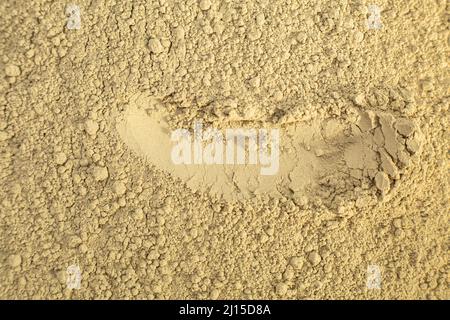 Close up of green natural bentonite clay powder for face mask, face cream, body wrap, selective focus. Abstract background Stock Photo
