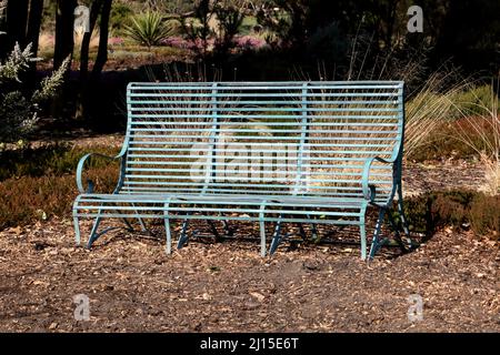 Metal Frame Bench in the Sun At Wisley RHS Garden Surrey England Stock Photo
