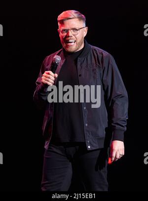 Rob Beckett performs on stage during the Teenage Cancer Trust Concert, Royal Albert Hall, London. Picture date: Tuesday March 22, 2022. Stock Photo