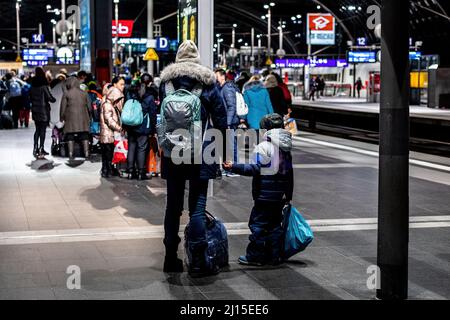 Berlin, Germany. 08th Mar, 2022. A Ukrainian mother and son stand on the platform at the Berlin Central Station. Since the war began, more than 3 million refugees have fled Ukraine. Credit: SOPA Images Limited/Alamy Live News Stock Photo