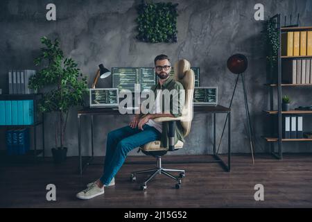 Photo of geek nerd guy dressed denim jacket eyeglasses communicating modern  gadget isolated orange color background Stock Photo - Alamy