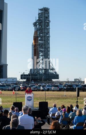 Kennedy Space Center director Janet Petro delivers remarks as the agency’s Space Launch System (SLS) rocket with the Orion spacecraft aboard rolls out of High Bay 3 of the Vehicle Assembly Building for the first time, Thursday, March 17, 2022, at NASA’s Kennedy Space Center in Florida. Ahead of NASA’s Artemis I flight test, the fully stacked and integrated SLS rocket and Orion spacecraft will undergo a wet dress rehearsal at Launch Complex 39B to verify systems and practice countdown procedures for the first launch. Photo Credit: (NASA/Keegan Barber) Stock Photo