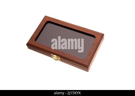A small wooden box with a transparent glass lid and a metal latch. Luxury packaging for a gift. Isolate on a white background. Stock Photo