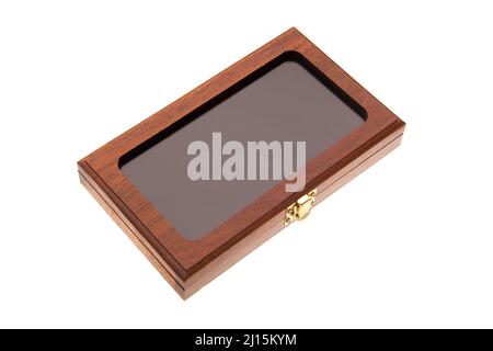 A small wooden box with a transparent glass lid and a metal latch. Luxury packaging for a gift. Isolate on a white background. Stock Photo