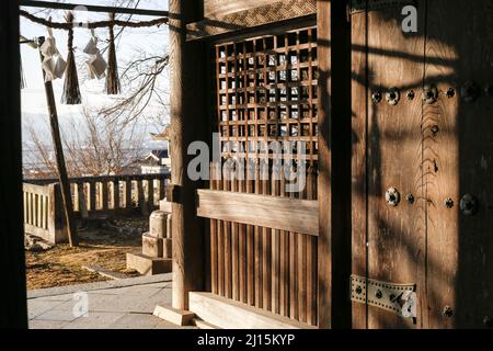iida, nagano, japan, 2022/03/03 , Detail of the Suijin Gate, at the Hakusan Shrine. This gate is what remain from the Edo period after the abolition o Stock Photo