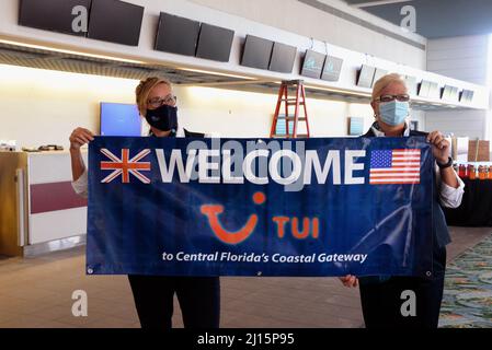 Melbourne. Brevard County. Florida. USA. March 22, 2022. Arriving from Manchester, England the first-ever transatlantic flight from the United Kingdom on TUI aircraft arrives at Melbourne Orlando International Airport. Major construction at Melbourne Airport is under way to handle 16 flights per week during the summer season arriving on Boeing 787 Dreamliner aircraft. 200 tourists plus crew arrived on this inaugural flight some staying locally and others bused to area attractions. Photo Credit: Julian Leek/Alamy Live News Stock Photo