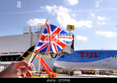Melbourne. Brevard County. Florida. USA. March 22, 2022. Arriving from Manchester, England the first-ever transatlantic flight from the United Kingdom on TUI aircraft arrives at Melbourne Orlando International Airport. Major construction at Melbourne Airport is under way to handle 16 flights per week during the summer season arriving on Boeing 787 Dreamliner aircraft. 200 tourists plus crew arrived on this inaugural flight some staying locally and others bused to area attractions. Photo Credit: Julian Leek/Alamy Live News Stock Photo