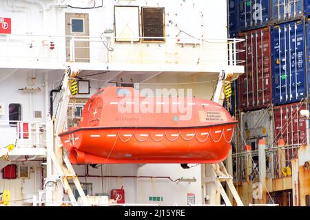 Oakland, CA - Feb 14, 2022: A lifeboat is one of the most important life-saving equipments onboard a ship, which is used at the time of extreme emerge Stock Photo
