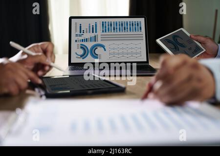 Business team discussing working analyzing with financial data strategy business plan for investment, finance analysis concept Stock Photo