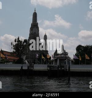 Buddhist Temple of the Dawn aka Wat Arun Ratchawararam Ratchawaramahawihan aka Wat Arun on the  Chao Phraya River Bangkok Thailand Stock Photo