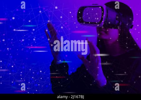 woman wearing VR glasses touch virtual screen metaverse technology global internet connection virtual social network. Stock Photo