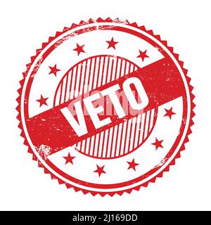 VETO text written on red grungy zig zag borders round stamp. Stock Photo