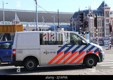 dutch police van on street in front of central station Amsterdam, the Netherlands, March 2022 Stock Photo