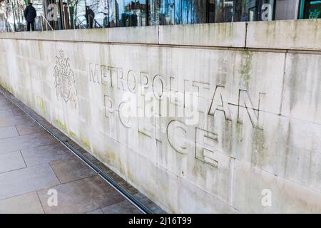 Metropolitan Police sign engraved on wall at New Scotland Yard,London,England,UK Stock Photo
