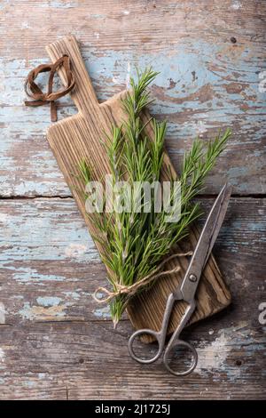 Kitchen herbs of green thyme for healthy food on rustic wooden background Stock Photo