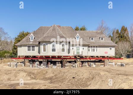 Large home lifted on blocks Stock Photo