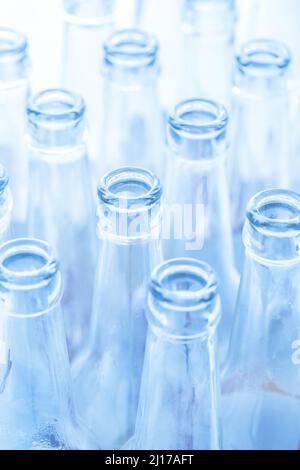 Empty glass bottles ready for recycling Stock Photo