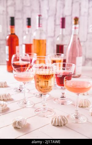 Assortment of rose wine, champagne, cocktails with bottles Stock Photo