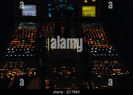 Push buttons on control panel in illuminated cockpit Stock Photo