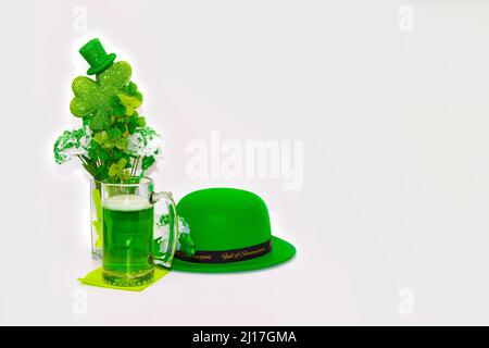 Stilllife of St. Patrick's Day decor with green beer and lost of copy space and background. Stock Photo