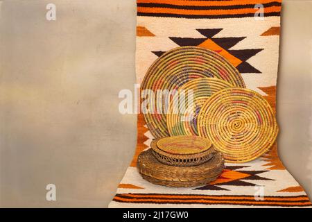 Still life of Indian blanket and baskets with copy space and background. Stock Photo