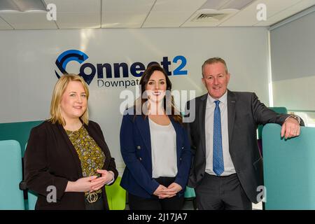 Rathkeltair House, Downpatrick, 23 March 2022 - Minister for Finance, Conor Murphy (R) with local Sinn Fein activists Una Hanlon (L) and Cathy Mason (C) at the launch of the Connect 2 Hub Stock Photo