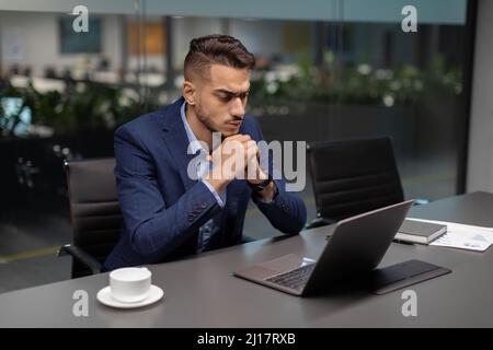 Concentrated arabic manager working on business project Stock Photo