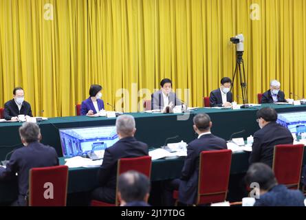 Beijing, China. 23rd Mar, 2022. Li Zhanshu, a member of the Standing Committee of the Political Bureau of the Communist Party of China (CPC) Central Committee and chairman of the National People's Congress (NPC) Standing Committee, presides over a meeting of lawmakers from an inspection team under the NPC Standing Committee to hear a report on the enforcement of the environmental protection law, in Beijing, capital of China, March 23, 2022. Credit: Wang Ye/Xinhua/Alamy Live News Stock Photo