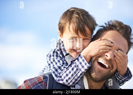 Fun with dad. Shjot of a father and son enjoying a day outdoors. Stock Photo