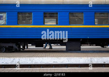 Lviv, Ukraine. 23rd Mar, 2022. People walk to board their train. The Lviv train station continues to play a major roll in the evacuation of Ukrainians and bringing supplies into the country. (Photo by Ty ONeil/SOPA Images/Sipa USA) Credit: Sipa USA/Alamy Live News Stock Photo