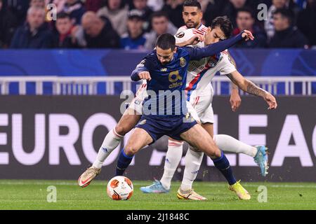 Lyon, France - March 17: Lucas Paquetá of Lyon (L) fights for the ball with Bruno Costa of FC Porto (R) during the UEFA Europa League Round of 16 Leg Stock Photo